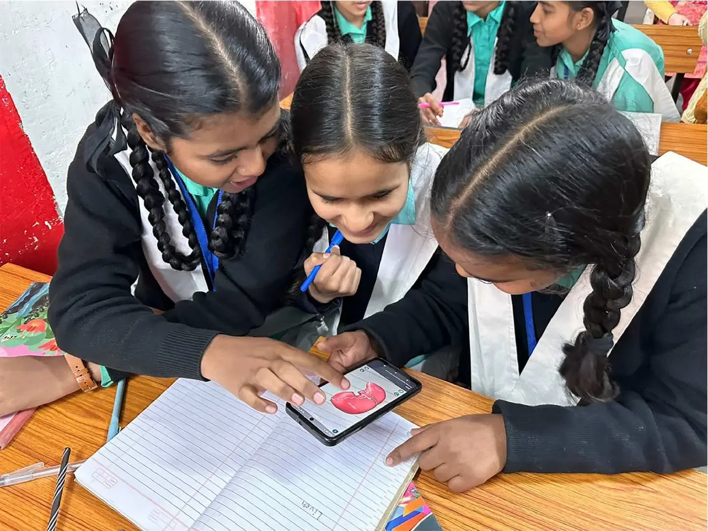 Students using an Embibe interactive lesson together